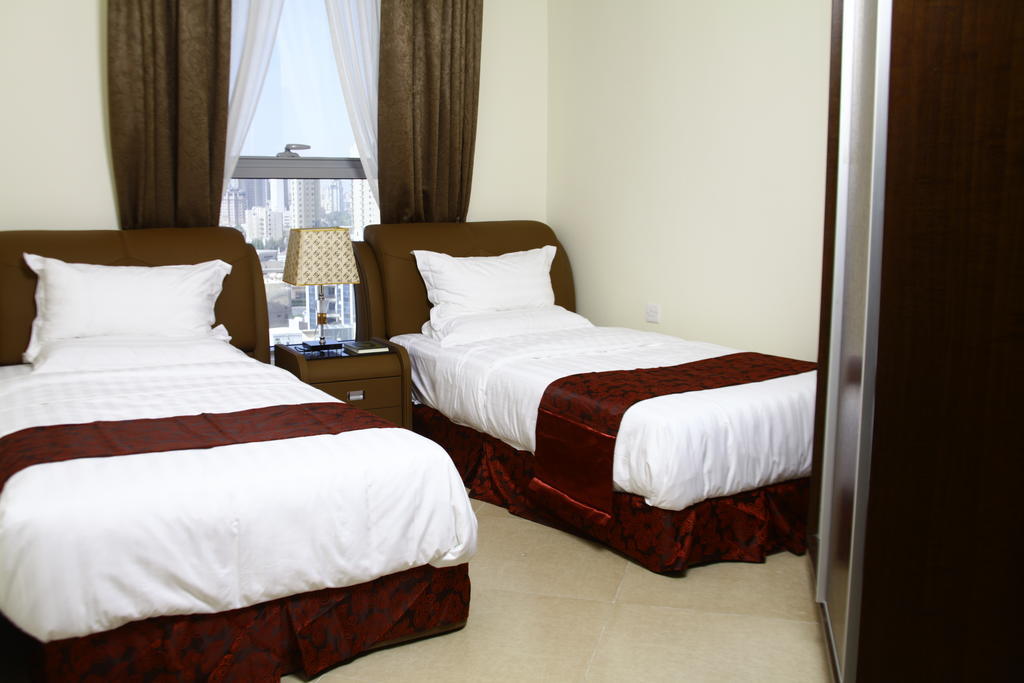 כוויית Laguna Hotel Suites חדר תמונה